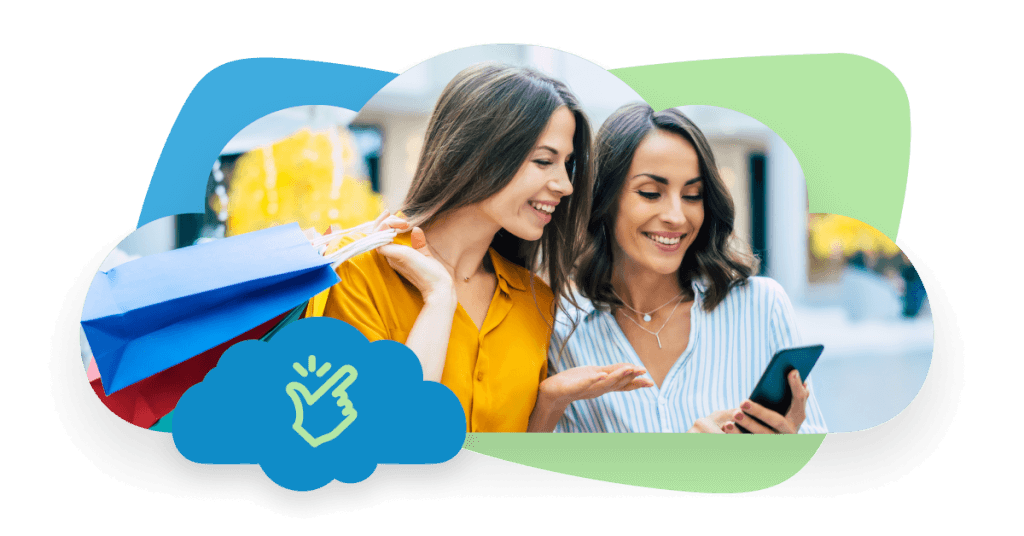 dos mujeres comprando y mirando el móvil